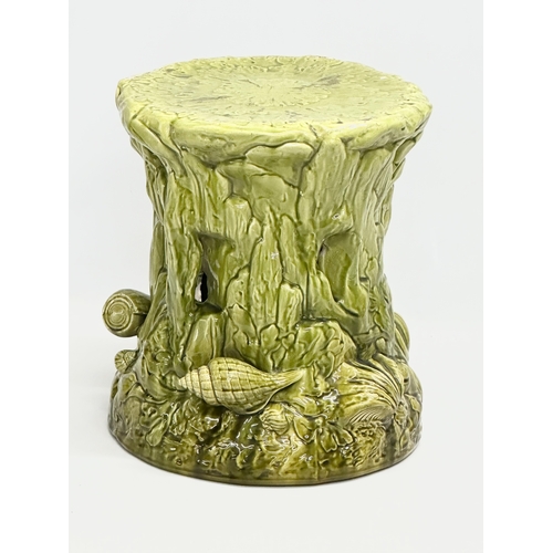 123 - 2 Late 19th Century Majolica garden seats/jardiniere stands. 1 (Bretby) damaged. 35x29cm. 31x34cm