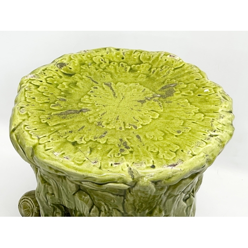 123 - 2 Late 19th Century Majolica garden seats/jardiniere stands. 1 (Bretby) damaged. 35x29cm. 31x34cm