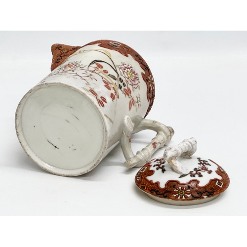 8 - A 19th Century Japanese hand painted chocolate pot/teapot. With bamboo design handle and embossed fl... 