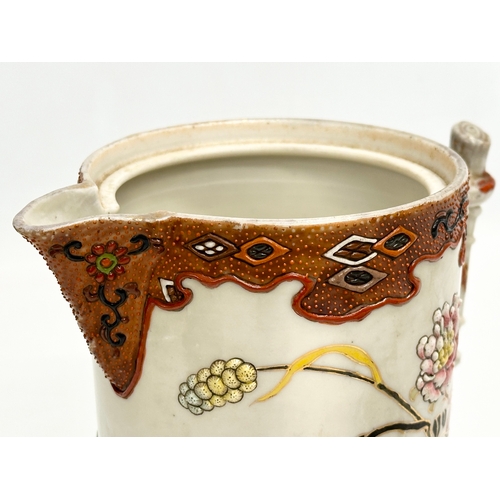 8 - A 19th Century Japanese hand painted chocolate pot/teapot. With bamboo design handle and embossed fl... 