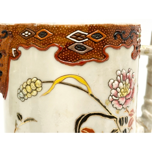 8 - A 19th Century Japanese hand painted chocolate pot/teapot. With bamboo design handle and embossed fl... 