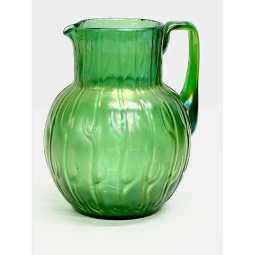 11 - A Loetz ‘Neptune’ water jug. Circa 1900. 13x12x16cm