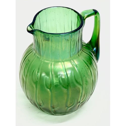 11 - A Loetz ‘Neptune’ water jug. Circa 1900. 13x12x16cm