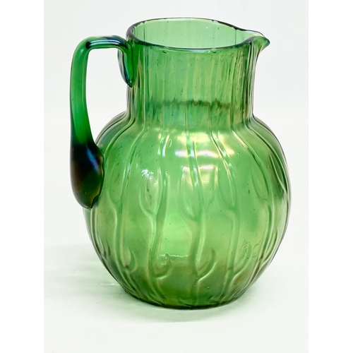 11 - A Loetz ‘Neptune’ water jug. Circa 1900. 13x12x16cm