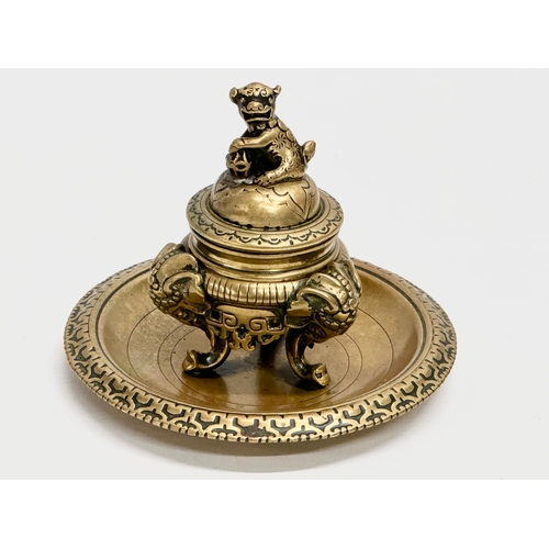 17 - A Late 19th Century Victorian brass Burmese style inkwell/inkstand. 12.5x10cm