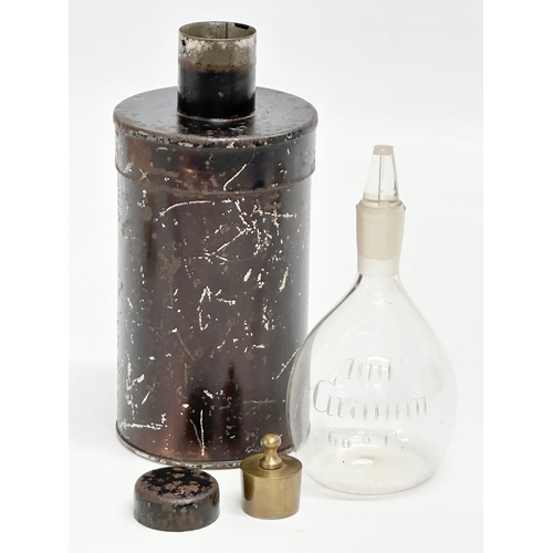 19 - An Early/Mid 19th Century apothecary glass bottle with original tin and weight in lid. 15cm