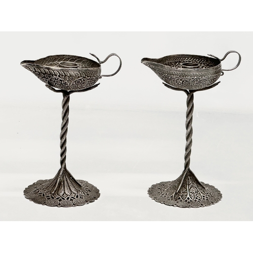 23 - A pair of Late 19th Century candleholder oil lamps. With pierced plated bases and cobra columns. 12x... 