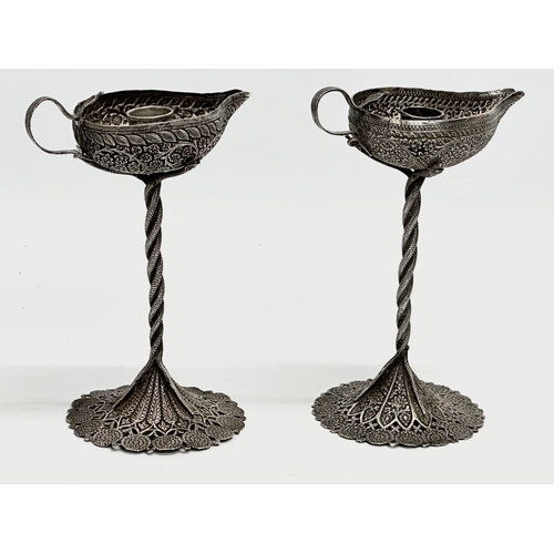 23 - A pair of Late 19th Century candleholder oil lamps. With pierced plated bases and cobra columns. 12x... 