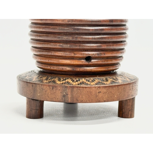 13 - A Mid 19th Century Lignum Vitae turned fruitwood beehive string box. 9x12cm