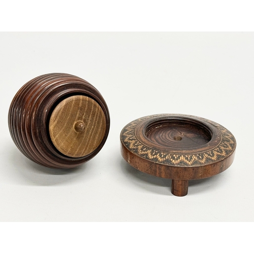 13 - A Mid 19th Century Lignum Vitae turned fruitwood beehive string box. 9x12cm