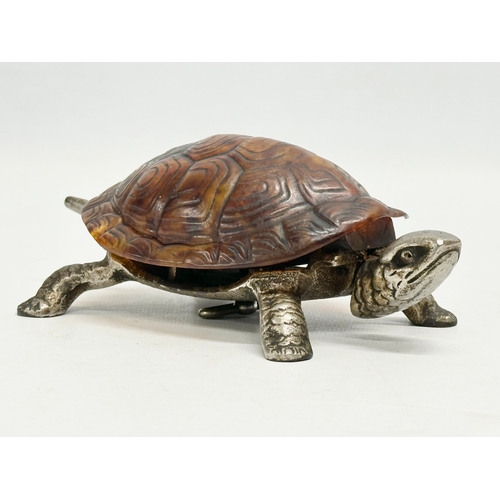 27 - An Early 20th Century clockwork novelty tortoise desk bell/service bell. 18cm. Working