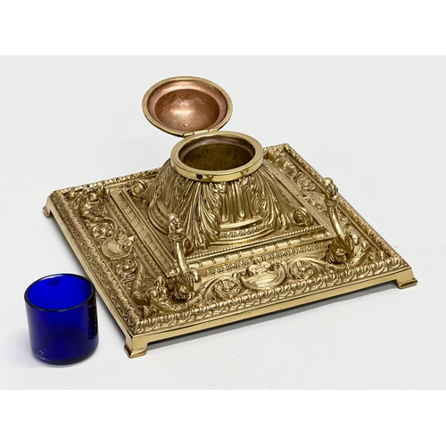 36 - A Late 19th Century Victorian brass inkstand/inkwell with original Bristol Blue liner. 18.5x18.5x10c... 