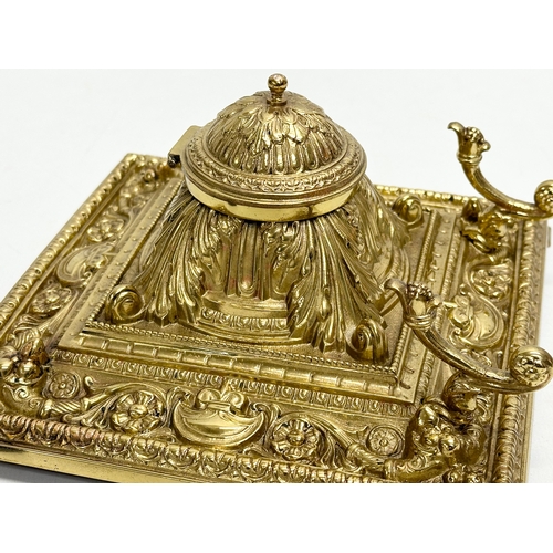 36 - A Late 19th Century Victorian brass inkstand/inkwell with original Bristol Blue liner. 18.5x18.5x10c... 