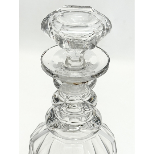 128 - A William IV/Early Victorian 3 ring slice cut decanter. Circa 1830-1840. 27.5cm