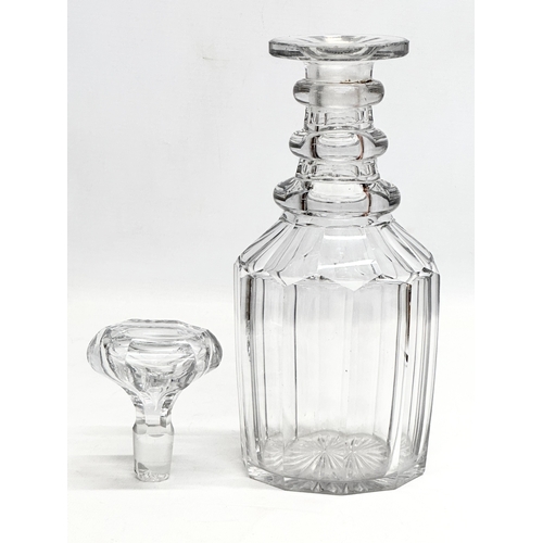 128 - A William IV/Early Victorian 3 ring slice cut decanter. Circa 1830-1840. 27.5cm