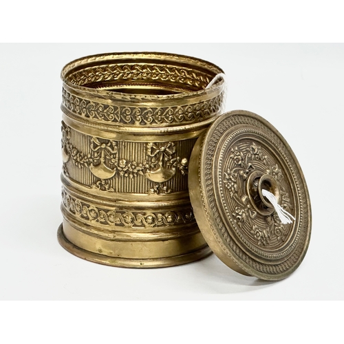 108 - A Late 19th Century ornate brass string box. 9x10cm