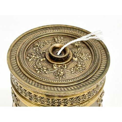 108 - A Late 19th Century ornate brass string box. 9x10cm