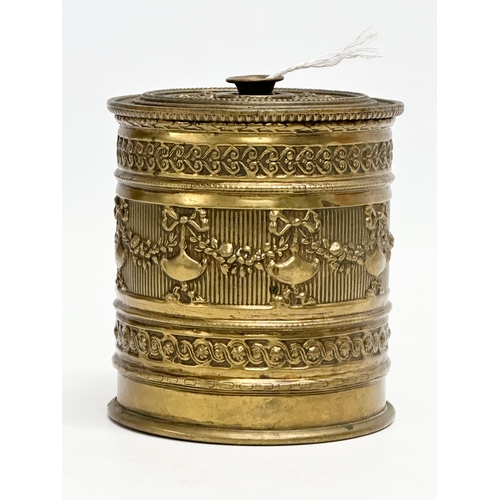 108 - A Late 19th Century ornate brass string box. 9x10cm