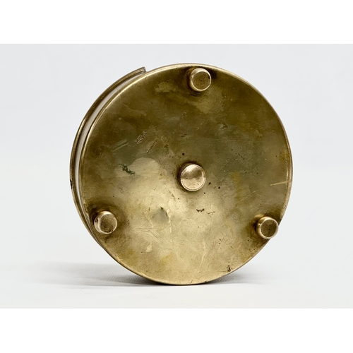 118 - A Late 19th/Early 20th Century brass revolving match striker. 12x5cm