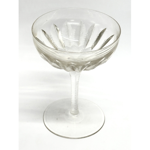 129 - A set of 4 Late 19th/Early 20th Century notch cut cocktail glasses/champagne glasses. 9x12cm