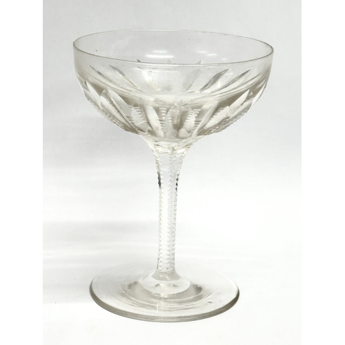 129 - A set of 4 Late 19th/Early 20th Century notch cut cocktail glasses/champagne glasses. 9x12cm