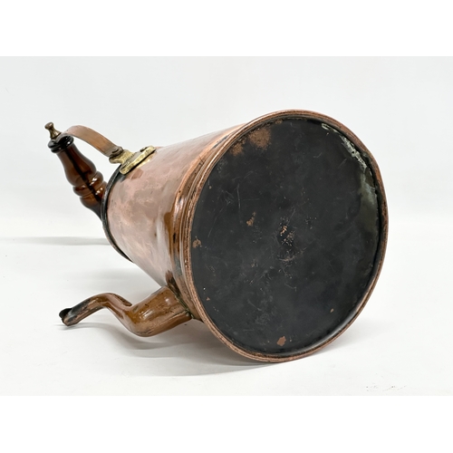 181 - A large Victorian copper coffee pot. 23x18x35cm including handle.