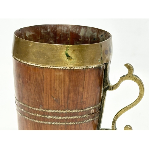 182 - A Late 19th Century Victorian brass bound Yew wood tankard. 12x8.5x13cm