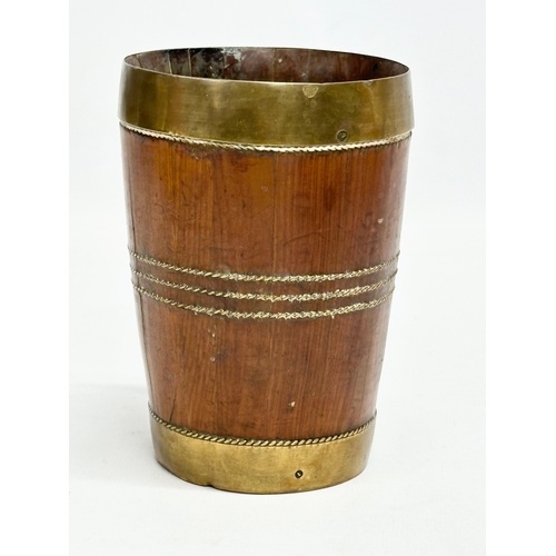 182 - A Late 19th Century Victorian brass bound Yew wood tankard. 12x8.5x13cm