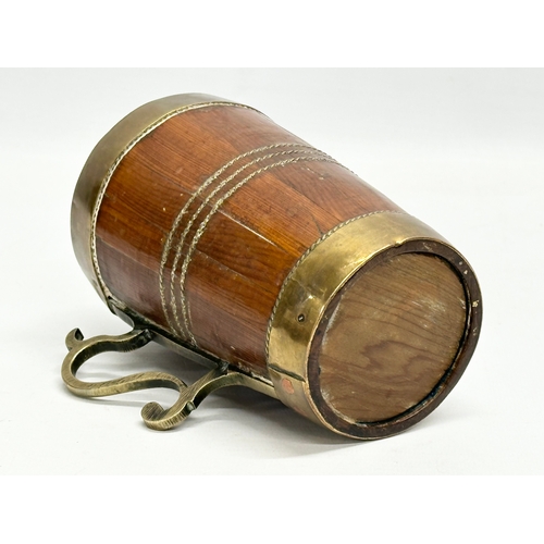 182 - A Late 19th Century Victorian brass bound Yew wood tankard. 12x8.5x13cm