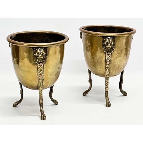 15 - A pair of Mid/Late 19th Century brass jardinières/planters raised on 3 lion paw feet and copper stud... 