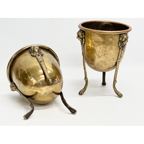 15 - A pair of Mid/Late 19th Century brass jardinières/planters raised on 3 lion paw feet and copper stud... 