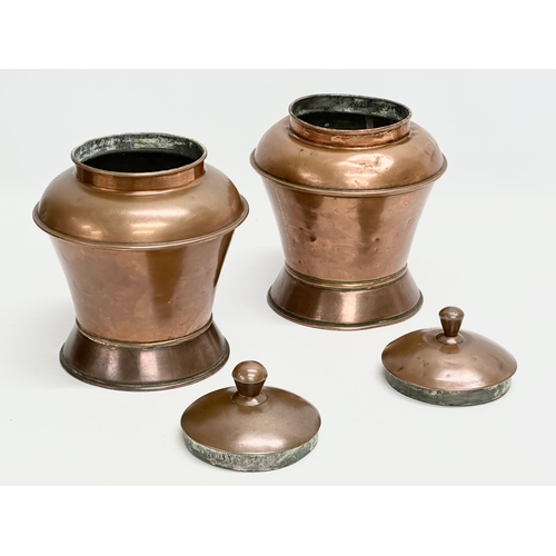 89 - A pair of Mid 19th Century Victorian copper tea canisters. 17x21cm