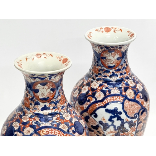 91 - A pair of large Late 19th Century Japanese Meiji period Imari baluster vases. Circa 1880. 15x31cm