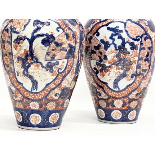 91 - A pair of large Late 19th Century Japanese Meiji period Imari baluster vases. Circa 1880. 15x31cm