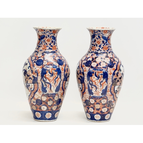 91 - A pair of large Late 19th Century Japanese Meiji period Imari baluster vases. Circa 1880. 15x31cm