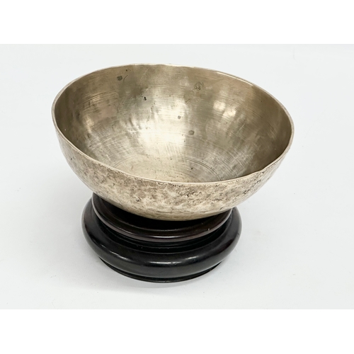 92 - A Late 19th Century Tibetan Singing bowl on stand. Bowl measures 16x6cm