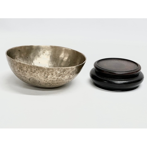 92 - A Late 19th Century Tibetan Singing bowl on stand. Bowl measures 16x6cm