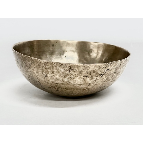 92 - A Late 19th Century Tibetan Singing bowl on stand. Bowl measures 16x6cm