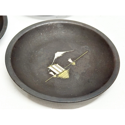 4 - An excellent set of 6 signed Japanese Meiji period Amita gold and silver inlaid iron dishes. 10cm