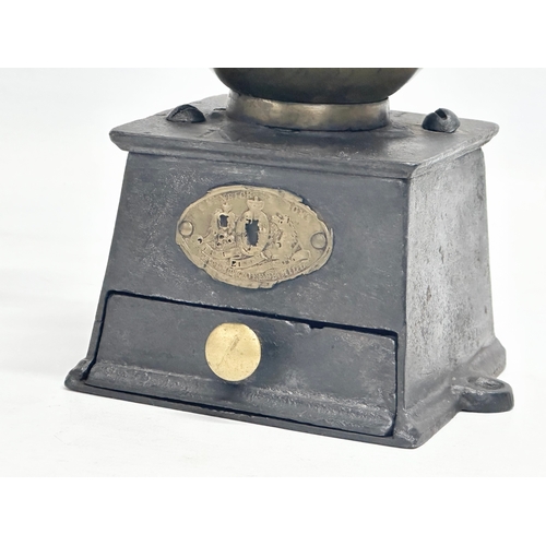 197 - A Late 19th Century Archibald Kenrick & Sons cast iron coffee grinder.