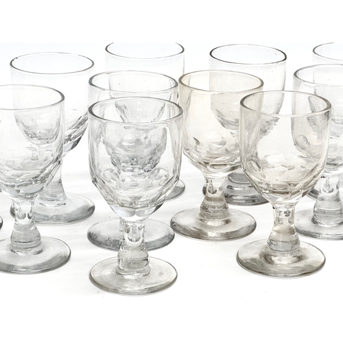 131 - A set of 11 Mid 19th Century Victorian glass lens cut rummers. Circa 1850-1870. 12cm