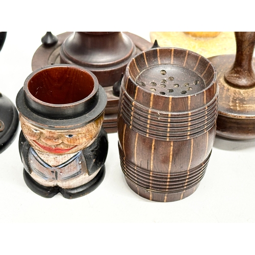 202 - A collection of 19th Century Treen Ware. Salt shaker, egg cups, butter pat, pestle etc