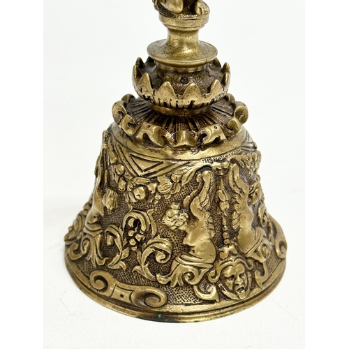 209 - 2 Late 19th Century brass and pewter bells. 16cm