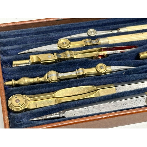 46 - A Late 19th Century Elliot Brothers bone and brass draughtsman’s set in mahogany case. 19.5x11x4.5cm