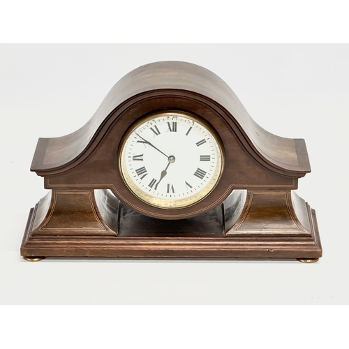 214 - An Edwardian inlaid mahogany mantle clock. 28x9x17cm