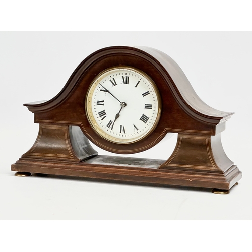 214 - An Edwardian inlaid mahogany mantle clock. 28x9x17cm