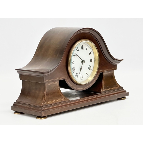 214 - An Edwardian inlaid mahogany mantle clock. 28x9x17cm