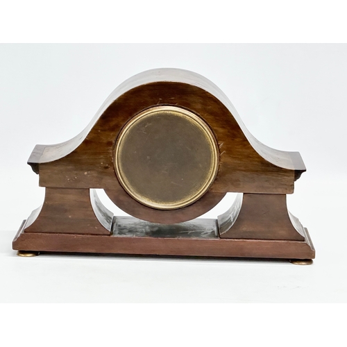 214 - An Edwardian inlaid mahogany mantle clock. 28x9x17cm