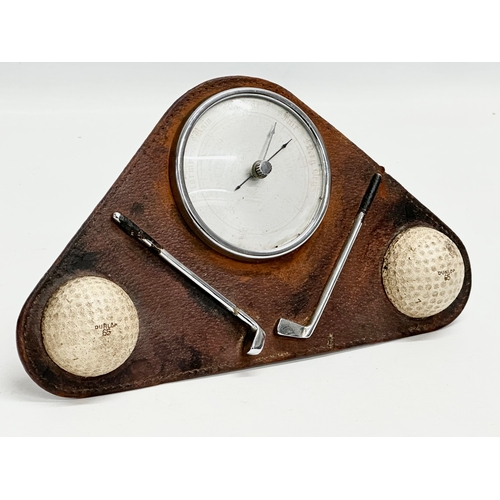 215 - A vintage Enbeeco ‘Golf’ barometer. 23x13cm