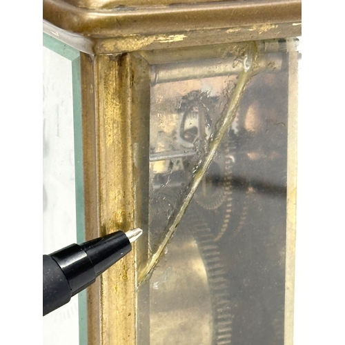 218 - A Mid/Late 19th Century French brass carriage clock. With key.